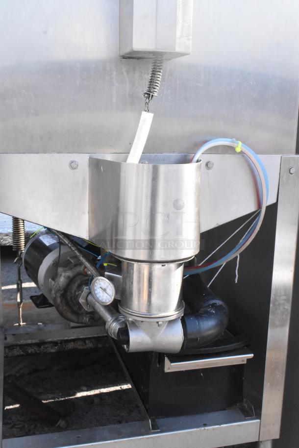 CMA AH-2 commercial pass-through dishwasher; stainless steel, 115 volts, 1 phase. Features pipes and gauges for functionality.