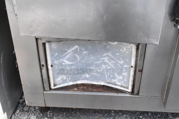 Commercial 2-door undercounter cooler, stainless steel, shows rust and wear, 115 volts, 1 phase, suitable for repair or parts.