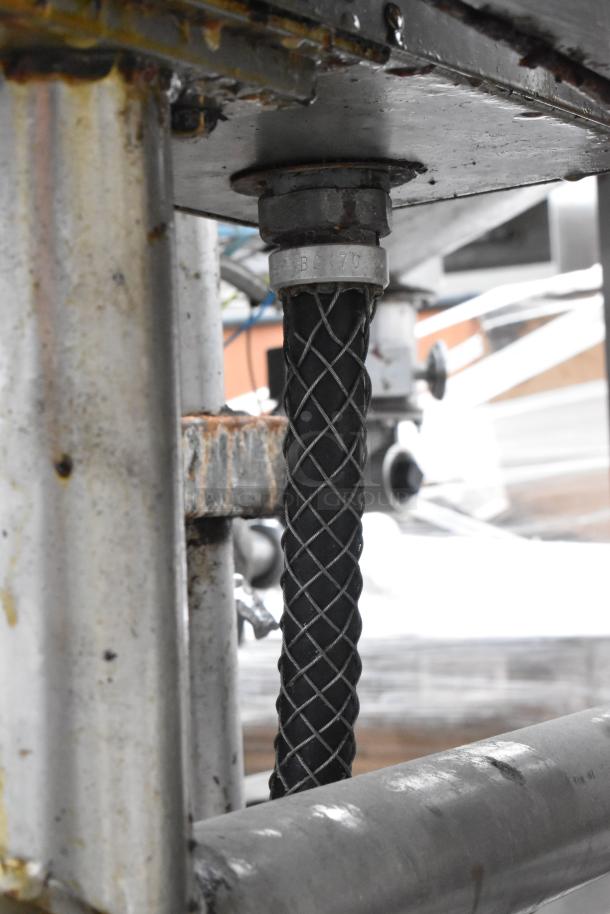 Groen FPC-3C commercial braising pan, electric, manual tilt, 208V, 3-phase. Close-up of base hose connection.