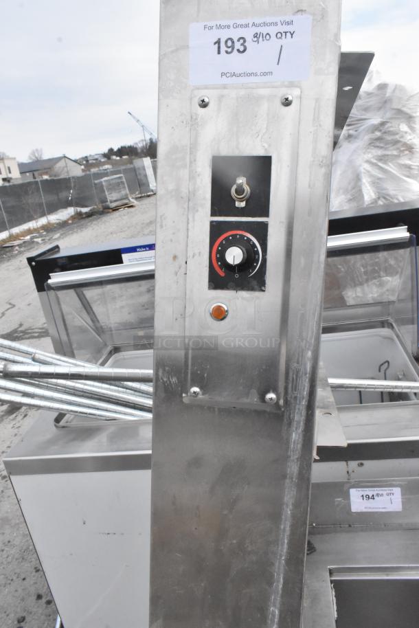 Hatco warmer with temperature control knob and toggle switch, stainless steel exterior, visible auction label.