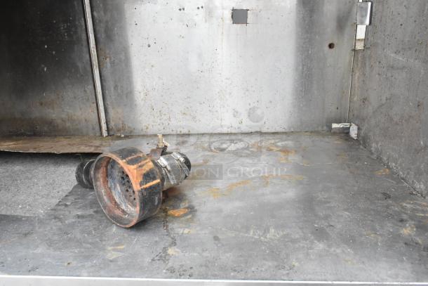 Commercial 3 bay sink with over shelf and 3 doors, stainless steel, used condition with visible rust and corrosion.