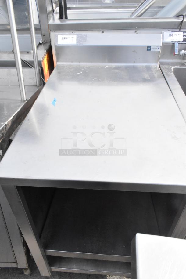 Commercial single bay sink with under shelf in stainless steel, sturdy condition, includes visible labeling and pricing tags.