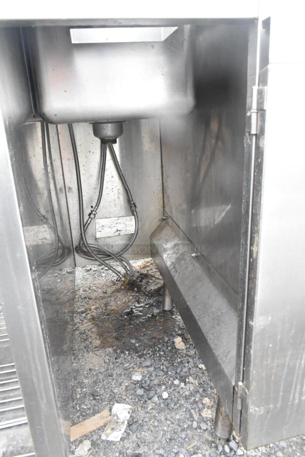 Commercial single bay sink with under shelf, stainless steel, pre-owned condition, visible plumbing connections.