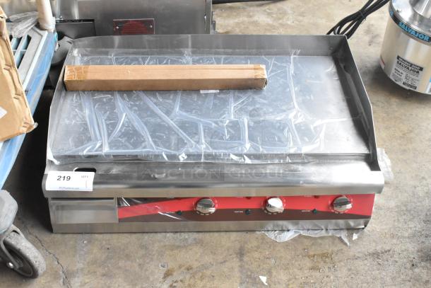 Brand new Avantco 177EG30N 30" electric countertop griddle, 208/240V, 1 phase, shown with protective plastic and minor scratches.