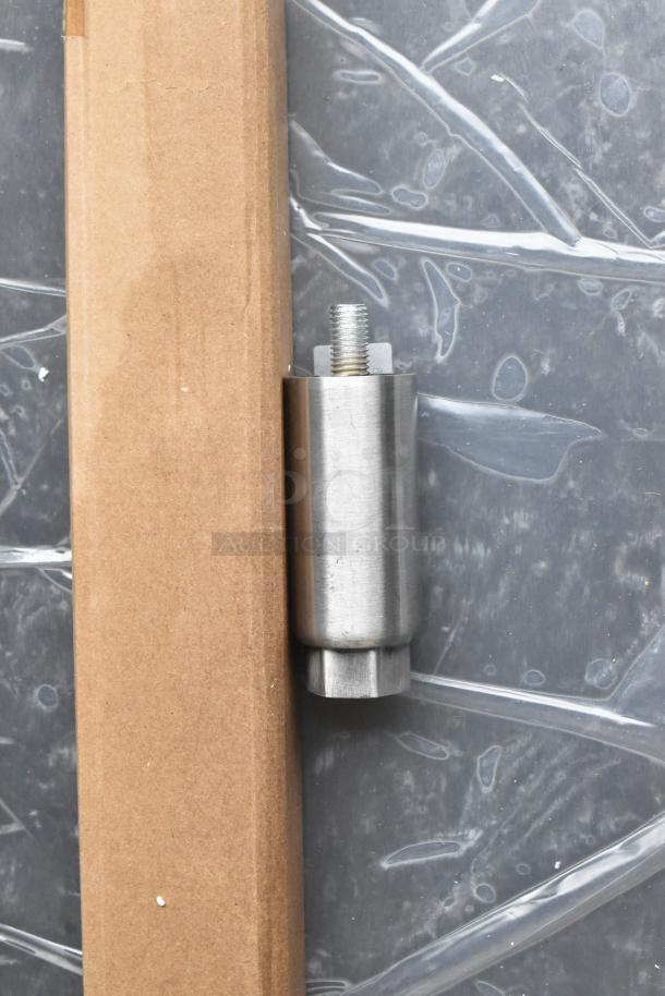 Avantco 177EG30N electric griddle component with cylindrical metal leg on plastic wrap and cardboard background. Brand new condition.