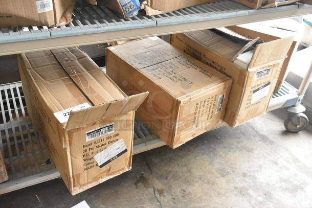 Four new scratch-and-dent boxes of K2811 Nut Master Nutcracker/Bottle Opener. Labeled with item details and made in China.