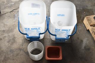 Two Ecolab poly ice buckets labeled "ICE ONLY," white plastic holder, and red square container on concrete floor.