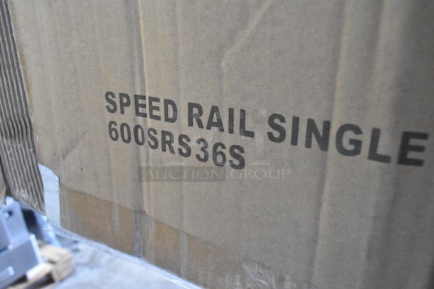 Cardboard box labeled "SPEED RAIL SINGLE 600SRS36S," containing new Regency Spec Line 36" stainless steel speed rail.