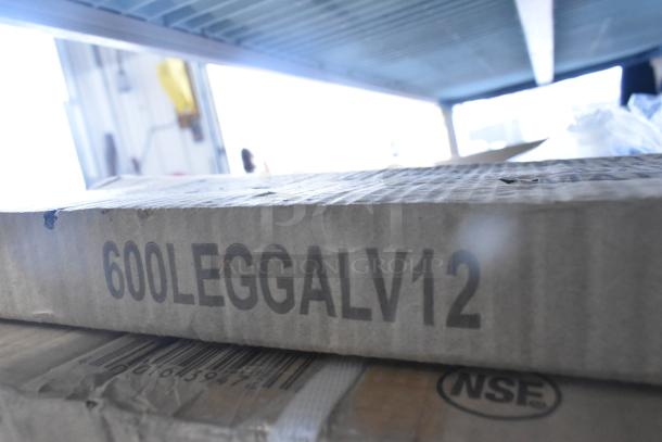 Cardboard box labeled "600LEGGALV12" containing a brand new Regency 20 1/2" galvanized steel leg for sinks, part of a scratch and dent sale.