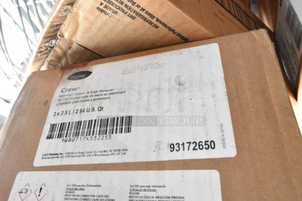 Box of Diversey Crew Bathroom Cleaner & Scale Remover, 2x2.5L, brand new, minor box wear, barcode and product info visible.