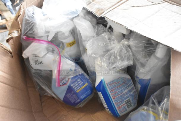 Box of 6 new Diversey and Clorox cleaning products, including Prominence Floor Cleaner, in plastic packaging.