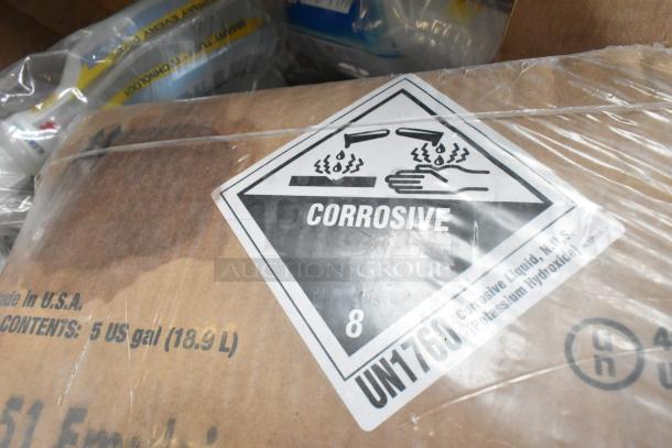 Sealed package with a “corrosive” warning label, containing Diversey cleaner, Delight creamer, and Clorox products. 5-gallon capacity.