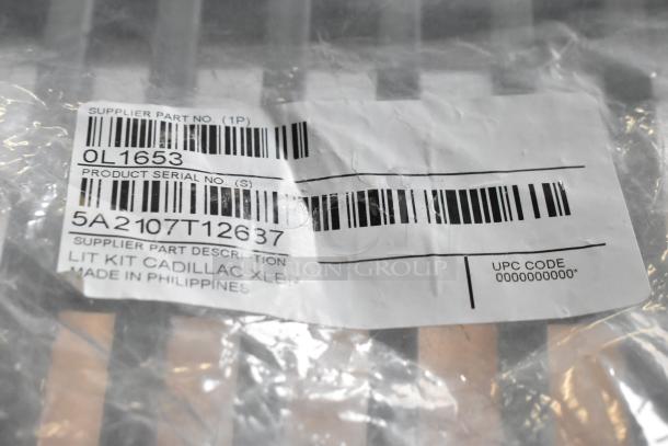 Plastic bag with label showing OL1653, part description for Cadillac XLBR, and product serial number 5A2107T12637.