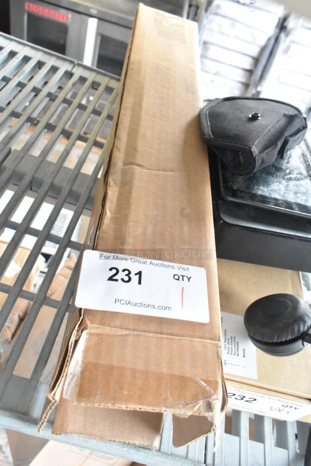 Cardboard box labeled "231" on metal shelf, containing PharMate PMD-250 Dispenser. Packaging shows signs of wear.