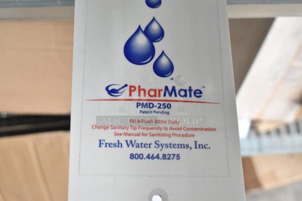 PharMate PMD-250 Dispenser label. Instructions for filling and flushing. Fresh Water Systems, Inc. contact info included.