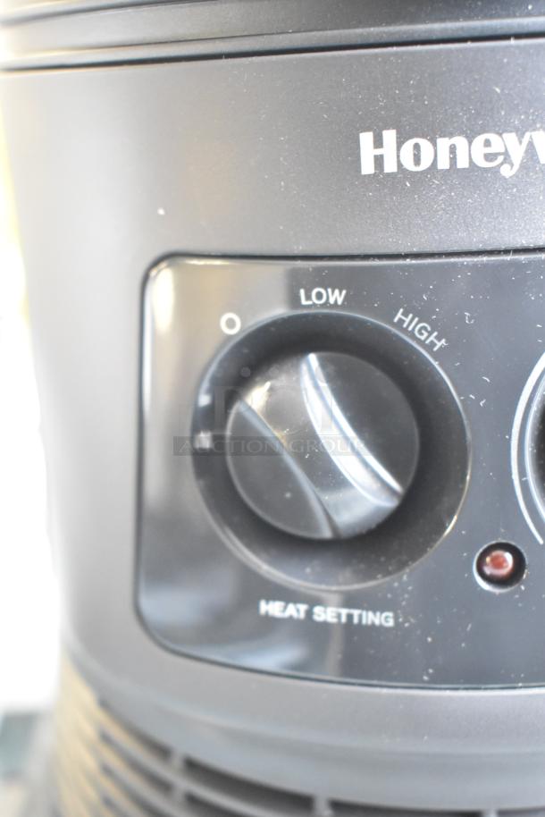 Honeywell HHF360VV2 heater, black, 120 volts, 1 phase, features adjustable heat setting dial from low to high.