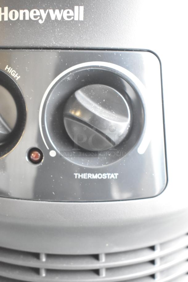 Honeywell HHF360VV2 heater, 120 volts, 1 phase, featuring thermostat control and high setting indicator.