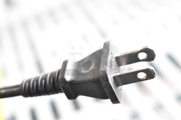 Close-up of the power plug for a Honeywell HHF360VV2 Heater, 120V, showing two prongs.