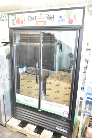 Brand new True TVM-48SL-HC 2-door cooler merchandiser with visible scratch and dent, 115V, 1 Phase.