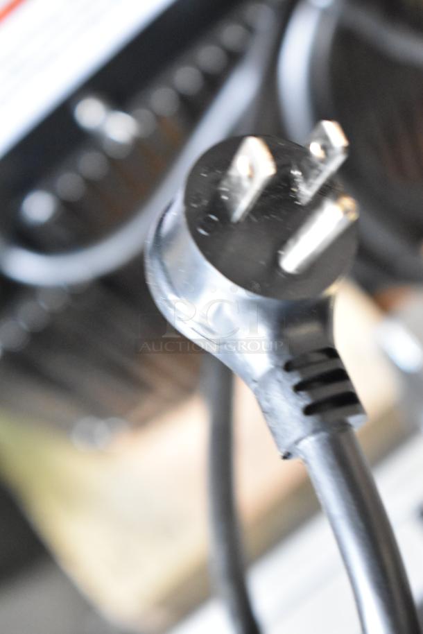 Power cord of 2025 True TVM-48SL-HC 2 Door Cooler Merchandiser, 115 Volts, emphasizing durability and electrical compatibility.