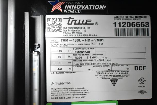 Alt Text: Model plate for True TVM-48SL-HC cooler, showing specs including 115V, refrigerant R290, and serial number 11206663.
