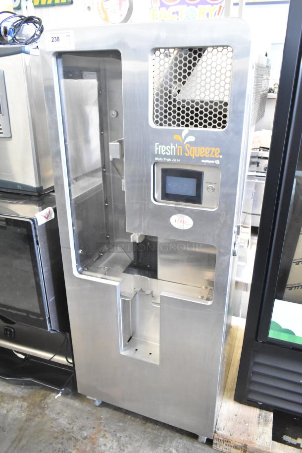 JBT 2ND-GEN-MFJ-HE citrus juicer on commercial casters, 115V, 1 Phase, stainless steel. Branded "Fresh 'n Squeeze."