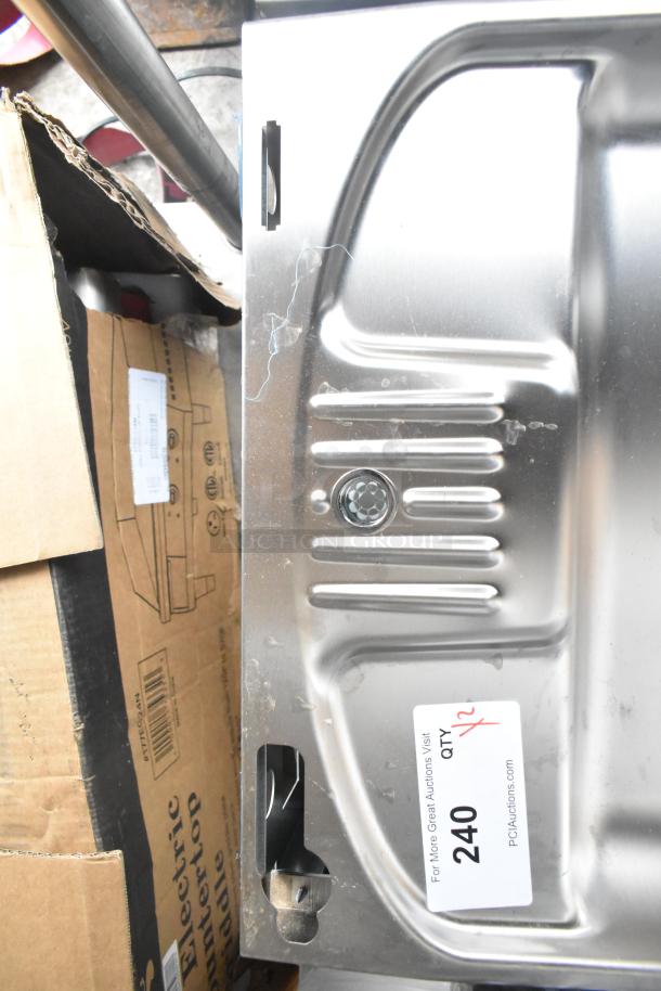 Brand new Elkay wall mount water fountain, scratch and dent condition. 115 volts, 1 phase. Auction tag indicates quantity: 2.