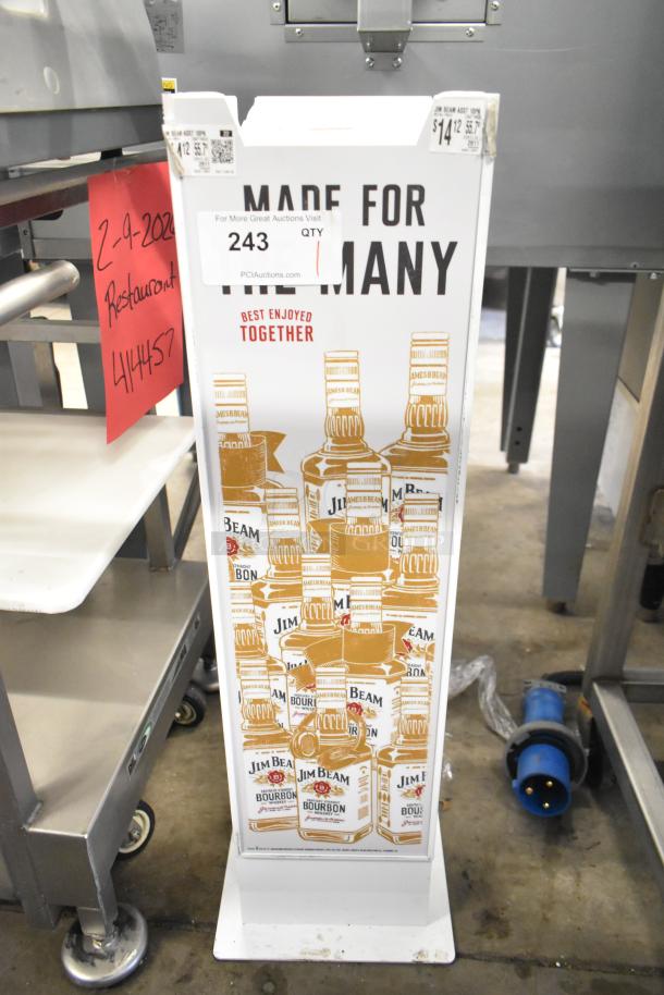 Jim Beam promotional sign featuring whiskey bottle graphics, "Made for the Many" text. Slight wear, auction label attached.