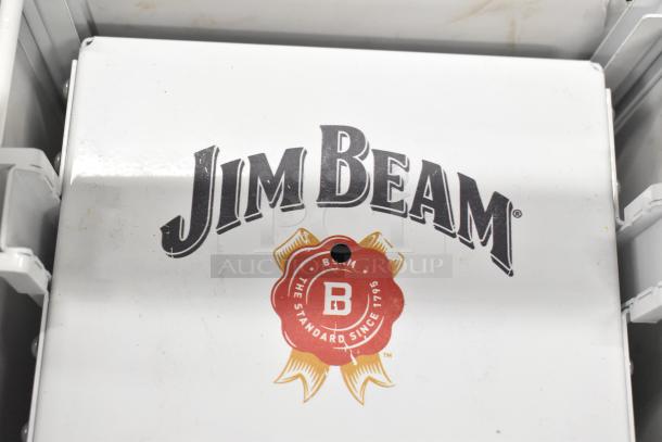 Jim Beam sign, white background, red and gold emblem, slight wear. Text reads "Jim Beam" and "The Standard Since 1795."