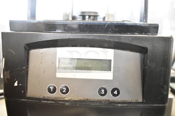 2022 Vita-Mix VM0145 countertop blender base. No pitcher. LCD screen with four numbered buttons. Used condition. 115 volts, 1 phase.