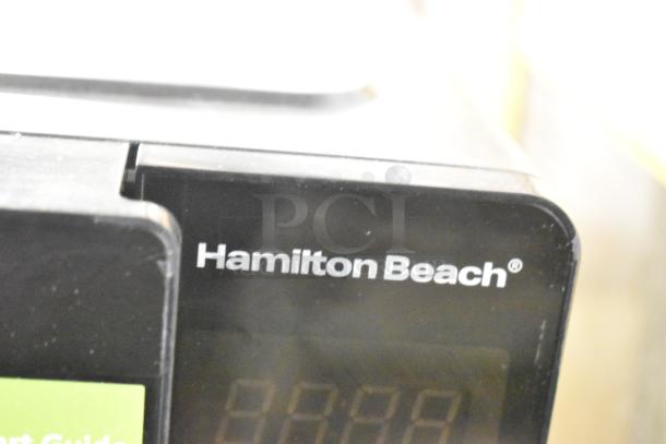 Hamilton Beach HB8436127995-02 countertop microwave, partial view showing logo, 120 volts, 1 phase, includes plate.