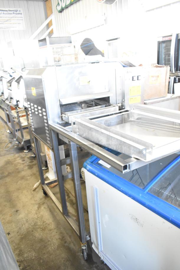 Belshaw Adamatic TG-50 stainless steel thermoglazing station with commercial casters, 208V, 1-phase, good condition.