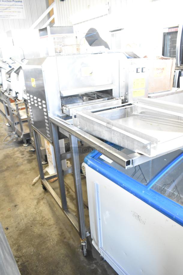 Belshaw Adamatic TG-50 stainless steel thermoglazing station on casters, 208V, 1 phase, in commercial setting.