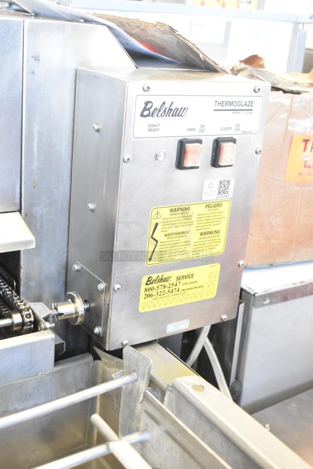 Belshaw Adamatic TG-50 Thermoglazing Station, stainless steel, commercial casters, 208V, 1 Phase, features control panel and safety labels.
