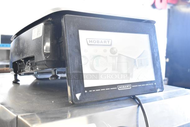 Hobart metal commercial countertop portioning scale, tested and working, 120/208-240 volts, 1 phase, black casing. Marked "Hobart."