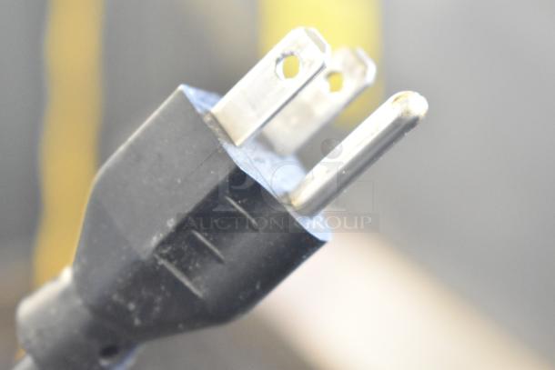 A close-up image of a black electrical plug for the Hobart Metal Commercial Countertop Food Portioning Scale.