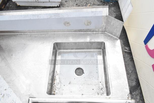 Brand new Regency 600DDTI72L 6' L-shape stainless steel dishtable, 16-gauge, soiled condition, left island orientation.