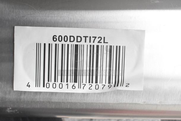 Barcode label on brand new Regency 600DDTI72L 6' 16-gauge stainless steel L-shape dishtable, indicating left island design.