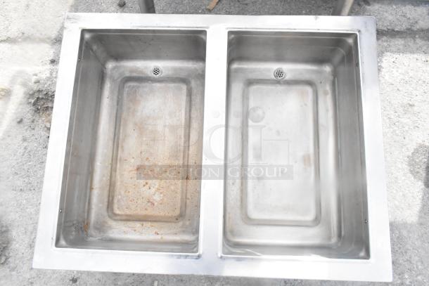 Commercial 2 well drop-in sink, stainless steel, dual compartments, visible wear, ideal for professional kitchens.