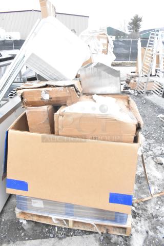 9 new scratch and dent items including Cambro catering case, bun warmer, trays, and ingredient bin on a pallet.