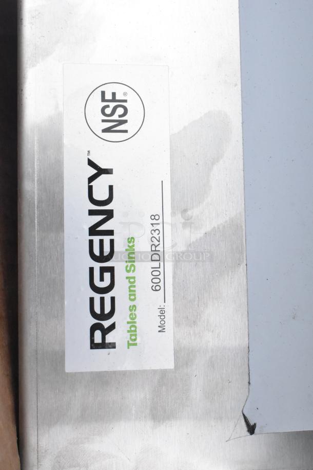 Regency NSF label on catering equipment, model 600LDR2318. Part of 9 new scratch and dent items in auction lot.