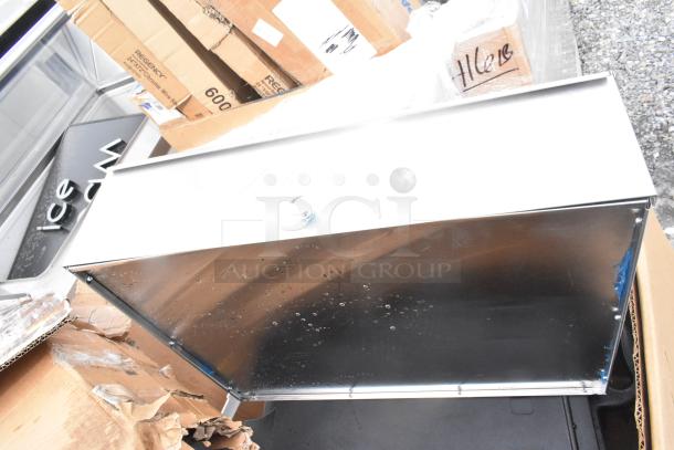 9 brand new scratch and dent items, including Cambro catering case, bun warmer, trays, and ingredient bin in packaging.