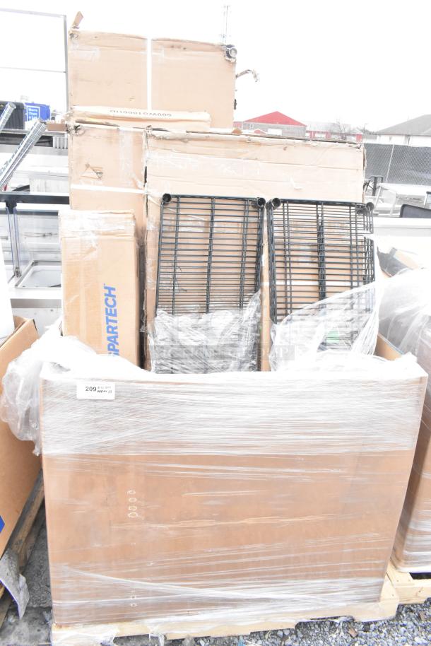 10-brand-new scratch and dent items including an evaporator coil, scale, and metal shelves, packaged on a palette with visible cardboard boxes.