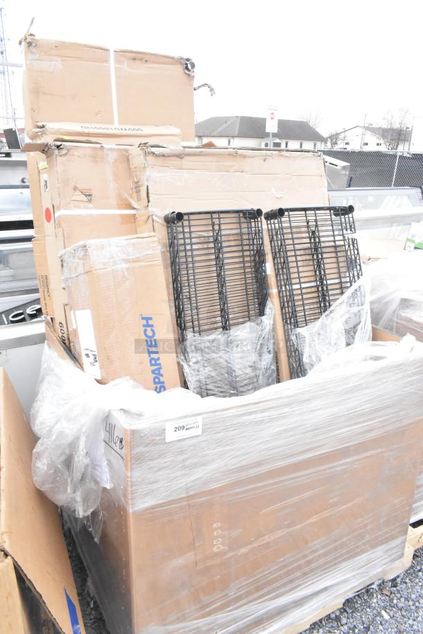 Stack of 10 brand new scratch and dent items including shelves and evaporator coil, wrapped in plastic with visible Spartech box.