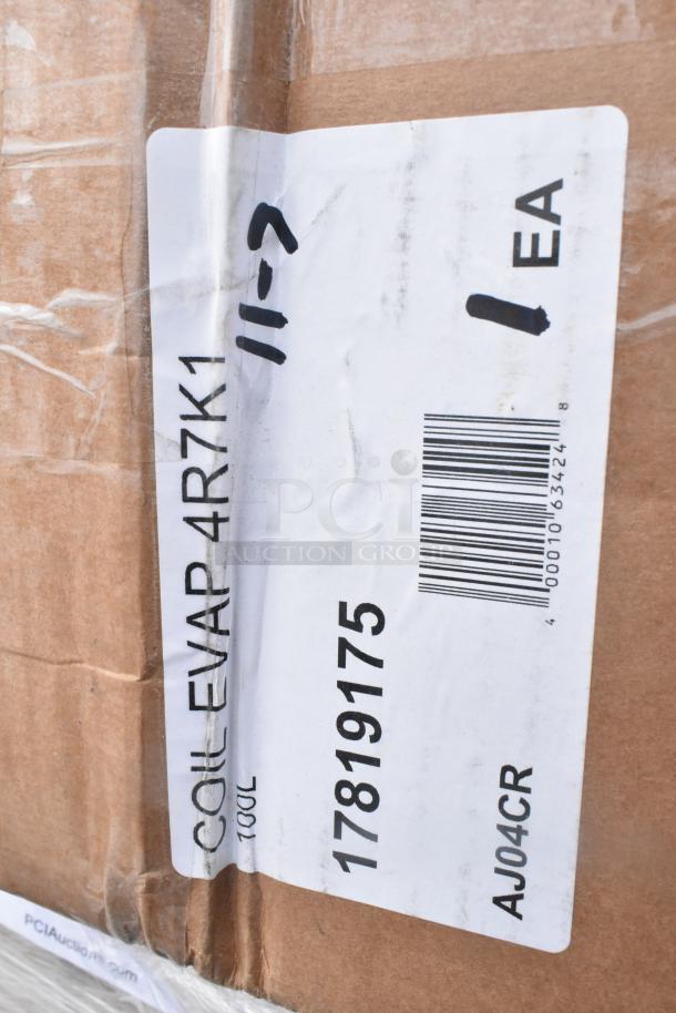 Box with label indicating "COIL EVAP 4R7K1," barcode, and item number "17819175." Box shows signs of wear.