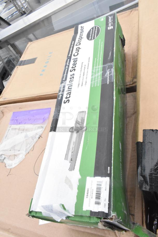 Boxed Stainless Steel Cup Dispenser, model CC6400, in new condition with minor packaging damage.