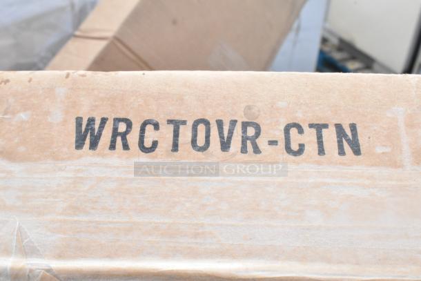 Cardboard box with "WRCTOVR-CTN" label, part of 17 new scratch and dent items including table and platform truck.