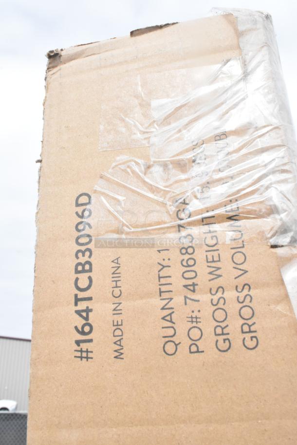 Cardboard box with manufacturer's label, #164TCB3096D, Made in China, sealed with clear tape, showing product details.