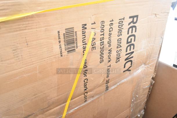 Cardboard box labeled Regency, containing 17 brand new scratch and dent items, including 60TSB3060S work table. Made in Vietnam.