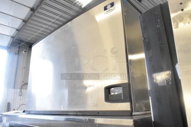 Manitowoc Commercial Ice Head on F1475 Ice Bin, stainless steel, 208-230V, 1-phase. Manitowoc logo on the front.